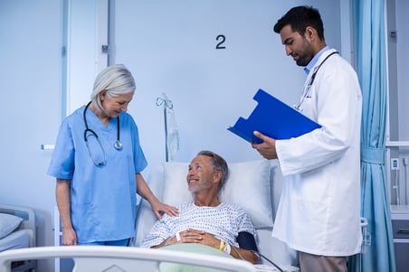 doctor-and-nurse-examining-a-patient-WJ532CG_sm