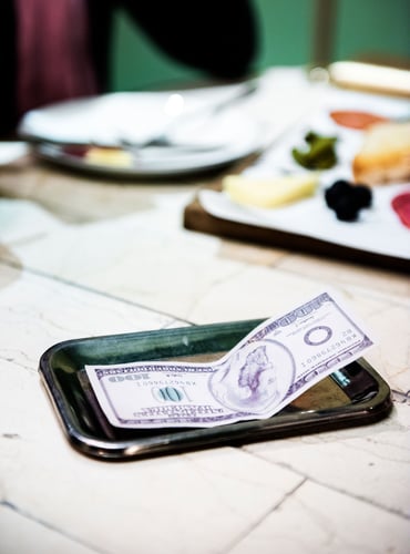 tip-on-the-dining-table-PNMABCW