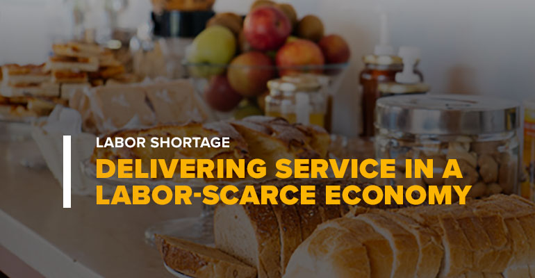 Hotel Dining Room With Text Labor Shortage: Delivering Service In A Labor-Scarce Economy