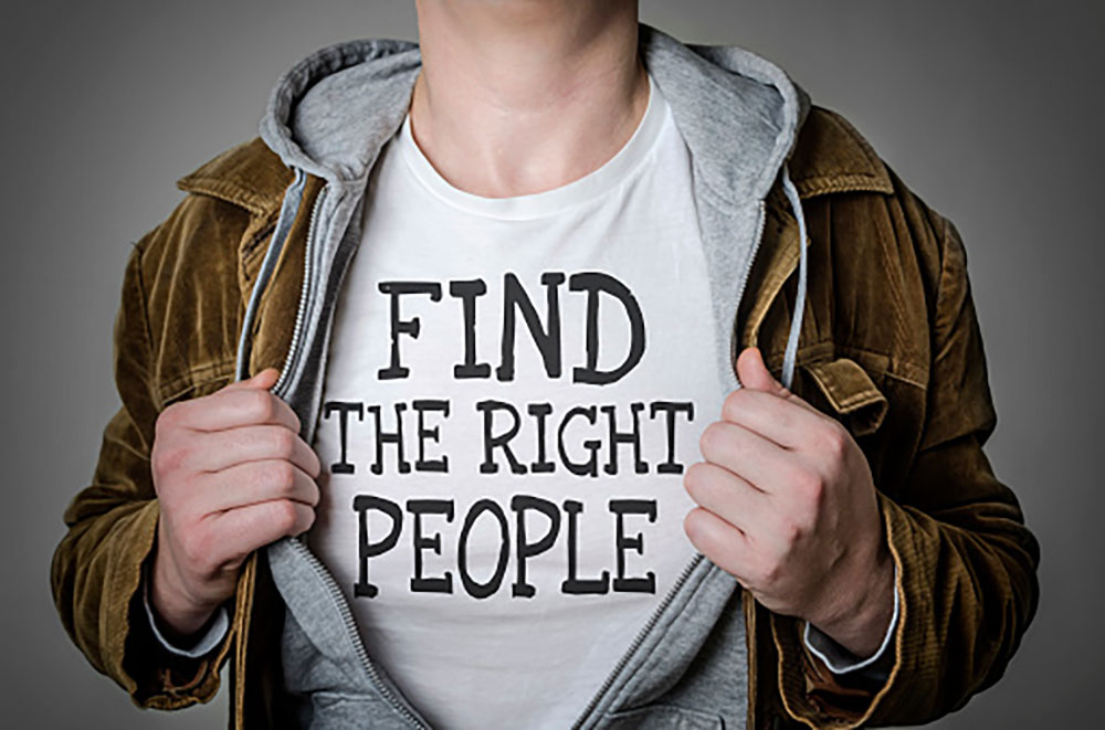 Man With T-Shirt Reading Find the Right People